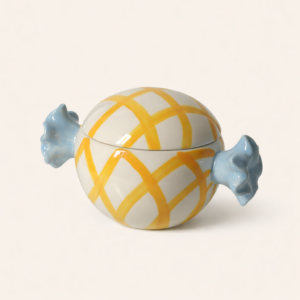 A vase designed like a candy wrap.