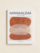 Warm neutrals and clean typography create an effortless styling piece. Stack it, lean it, or use it to tuck away remote controls and cords.